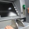 How do I use ATMs in Spain?